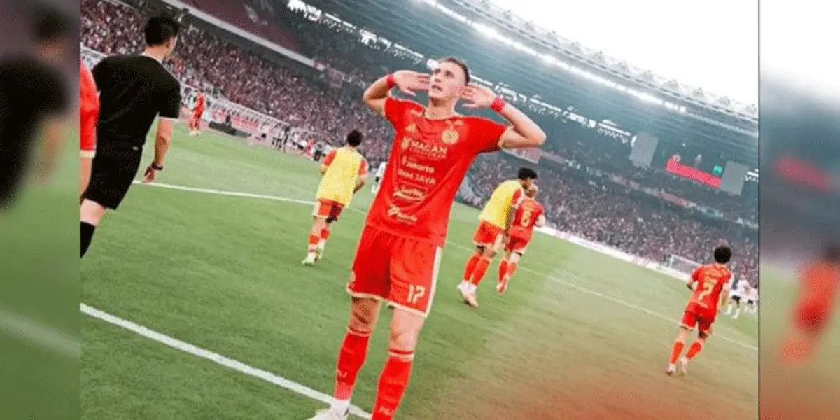 Pemain Persija Jakarta Ivan Mamut melakukan selebrasi usai mencetak gol ke gawang Persib Bandung di Stadion Utama GBK, Jakarta, Sabtu (12/9/2026).