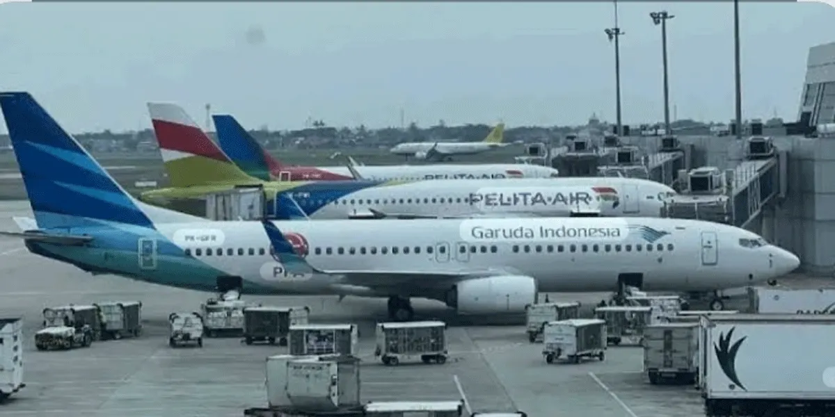 Ilustrasi pesawat di bandara.